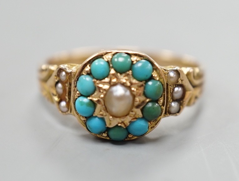 A George V 15ct gold, turquoise and split pearl set cluster ring, size K, gross weight 3 grams.